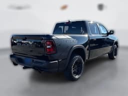 Ram 1500 Rebel 4x4 Crew Cab 5'7" Box 2026 — side view