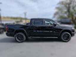 Ram 1500 Rebel 4x4 Crew Cab 5'7" Box 2026 — side view