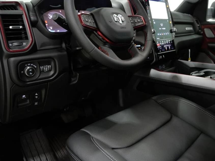 Ram 1500 Rebel 4x4 Crew Cab 5'7" Box 2027 — side view