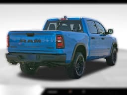 Ram 1500 Rebel 4x4 Crew Cab 5'7" Box 2026 — side view
