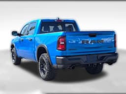 Ram 1500 Rebel 4x4 Crew Cab 5'7" Box 2026 — side view