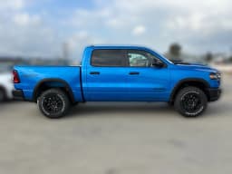 Ram 1500 Rebel 4x4 Crew Cab 5'7" Box 2026 — side view