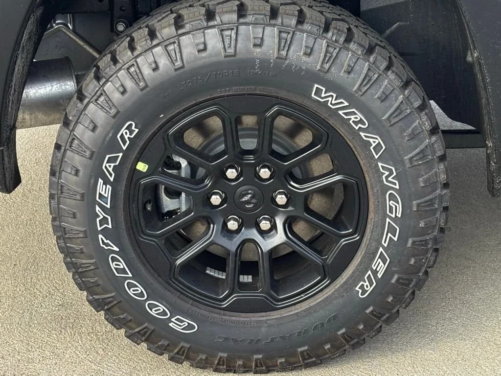 Ram 1500 Rebel 4x4 Crew Cab 5'7" Box 2026 — side view