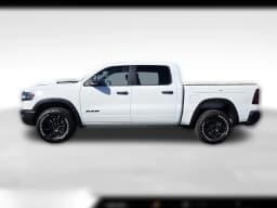 Ram 1500 Rebel 4x4 Crew Cab 5'7" Box 2026 — side view