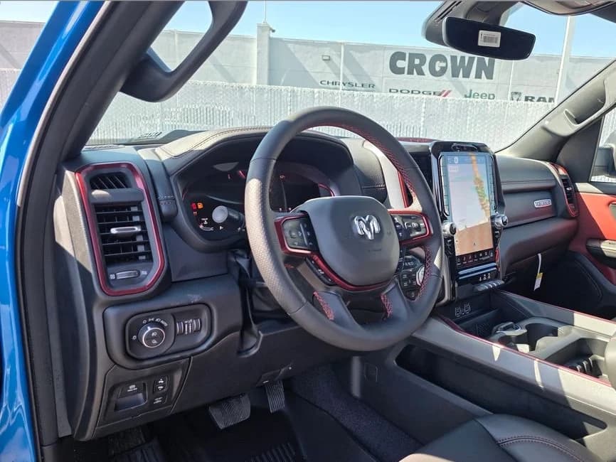 Ram 1500 Rebel 4x4 Crew Cab 5'7" Box 2026 — side view