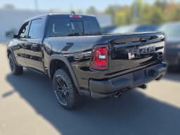 Ram 1500 Rebel 4x4 Crew Cab 5'7" Box 2026 — side view