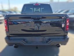 Ram 1500 Rebel 4x4 Crew Cab 5'7" Box 2026 — side view