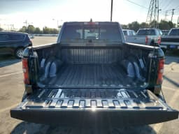 Ram 1500 Rebel 4x4 Crew Cab 5'7" Box 2026 — side view