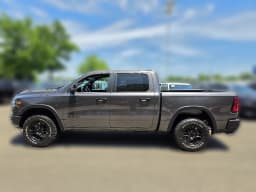Ram 1500 Rebel 4x4 Crew Cab 5'7" Box 2026 — side view