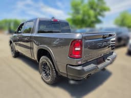 Ram 1500 Rebel 4x4 Crew Cab 5'7" Box 2026 — side view