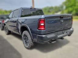Ram 1500 Rebel 4x4 Crew Cab 5'7" Box 2026 — side view