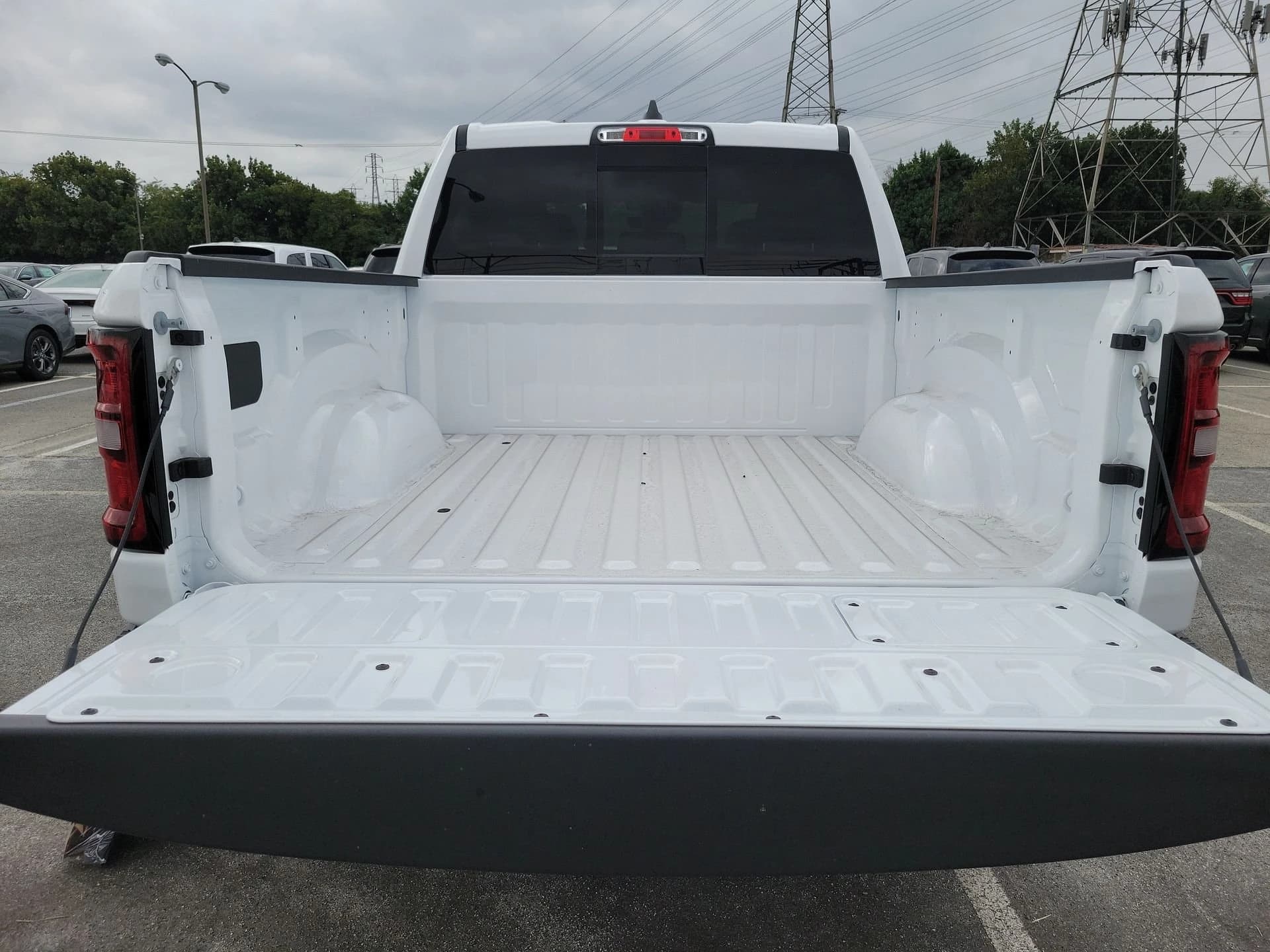 Ram 1500 Rebel 4x4 Crew Cab 5'7" Box 2026 — side view