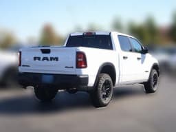 Ram 1500 Rebel 4x4 Crew Cab 5'7" Box 2026 — side view