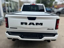 Ram 1500 Big Horn 4x4 Crew Cab 6'4" Box 2026 — side view