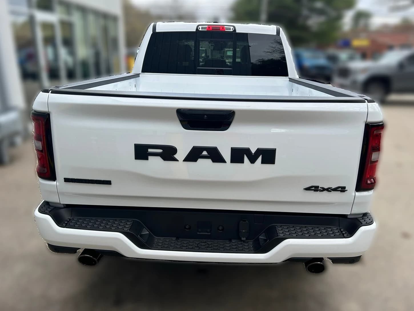 Ram 1500 Big Horn 4x4 Crew Cab 6'4" Box 2026 — side view