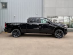 Ram 1500 Big Horn 4x4 Crew Cab 6'4" Box 2026 — side view