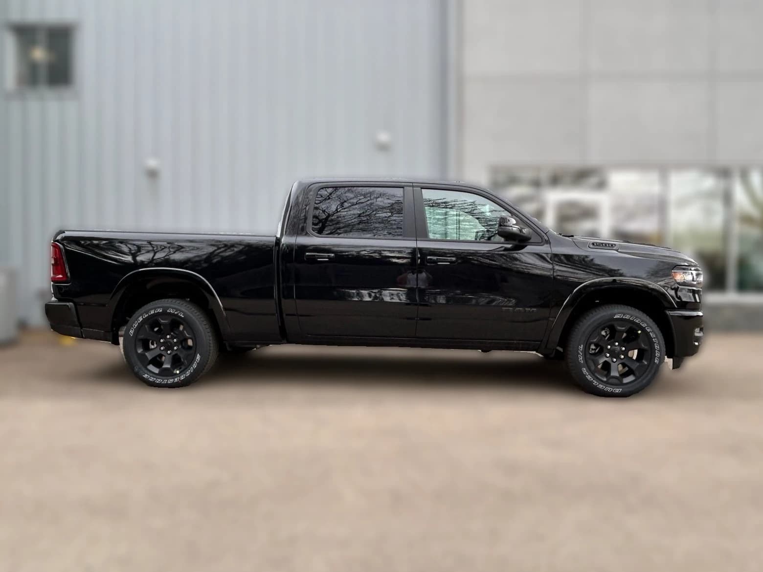 Ram 1500 Big Horn 4x4 Crew Cab 6'4" Box 2026 — side view