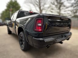 Ram 1500 Big Horn 4x4 Crew Cab 6'4" Box 2026 — side view