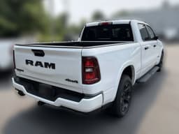 Ram 1500 Big Horn 4x4 Crew Cab 6'4" Box 2026 — side view