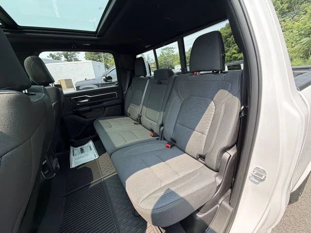 Ram 1500 Big Horn 4x4 Crew Cab 6'4" Box 2026 — side view