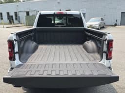 Ram 1500 Big Horn 4x4 Crew Cab 6'4" Box 2026 — side view
