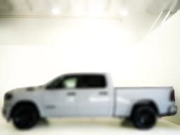 Ram 1500 Big Horn 4x4 Crew Cab 6'4" Box 2026 — side view
