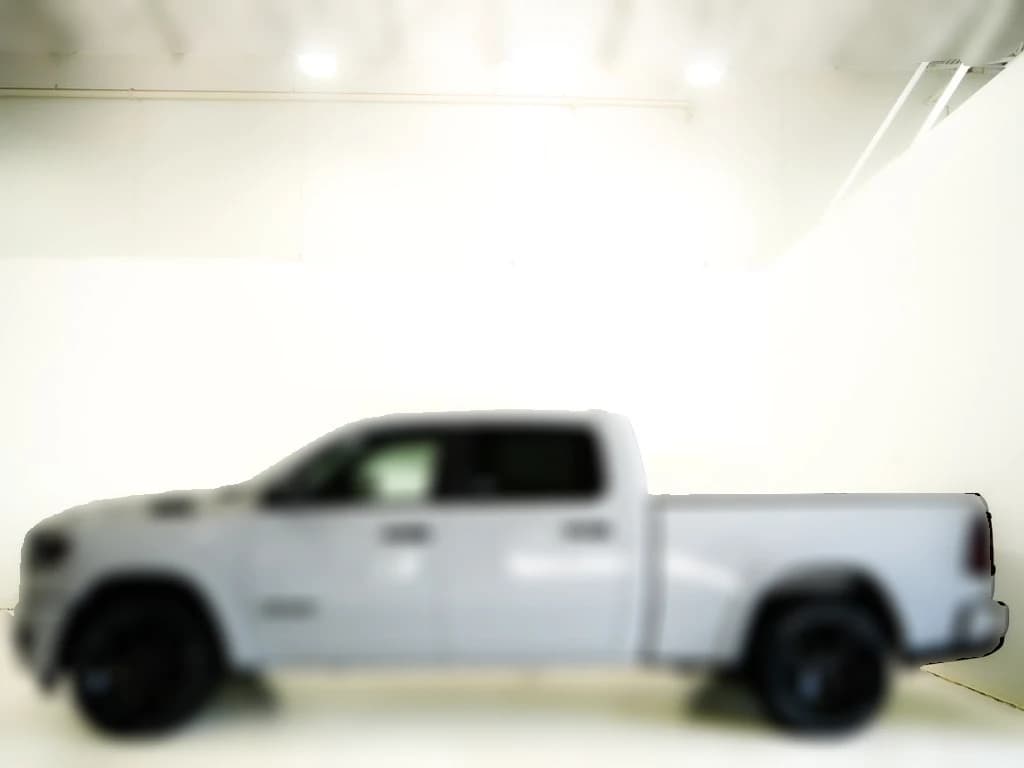Ram 1500 Big Horn 4x4 Crew Cab 6'4" Box 2026 — side view