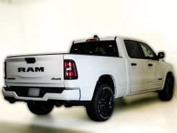 Ram 1500 Big Horn 4x4 Crew Cab 6'4" Box 2026 — side view