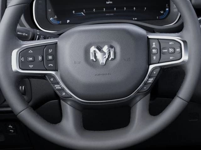 Ram 1500 Laramie 4x4 Crew Cab 6'4" Box 2026 — side view