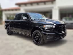 Ram 1500 Laramie 4x4 Crew Cab 6'4" Box 2026 — side view