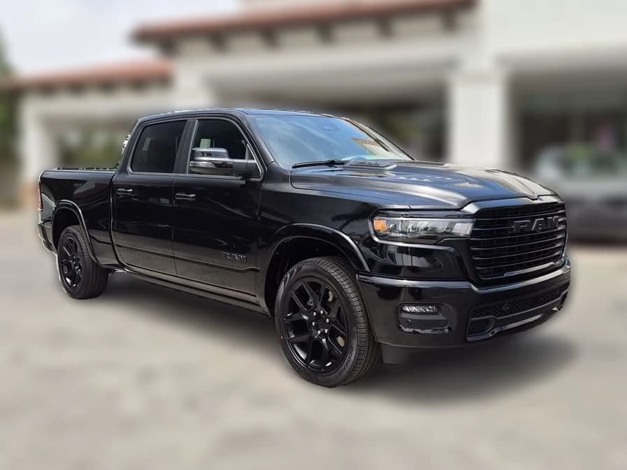 Ram 1500 Laramie 4x4 Crew Cab 6'4" Box 2026 — side view