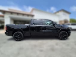 Ram 1500 Laramie 4x4 Crew Cab 6'4" Box 2026 — side view
