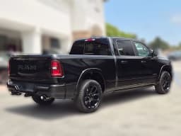 Ram 1500 Laramie 4x4 Crew Cab 6'4" Box 2026 — side view