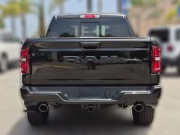 Ram 1500 Laramie 4x4 Crew Cab 6'4" Box 2026 — side view