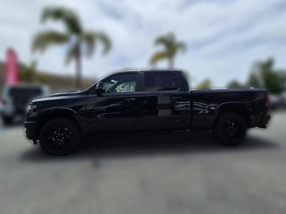 Ram 1500 Laramie 4x4 Crew Cab 6'4" Box 2026 — side view