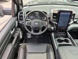 Ram 1500 Laramie 4x4 Crew Cab 6'4" Box 2026 — side view
