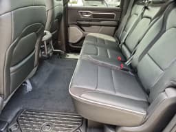 Ram 1500 Laramie 4x4 Crew Cab 6'4" Box 2026 — side view