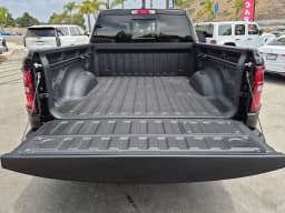 Ram 1500 Laramie 4x4 Crew Cab 6'4" Box 2026 — side view