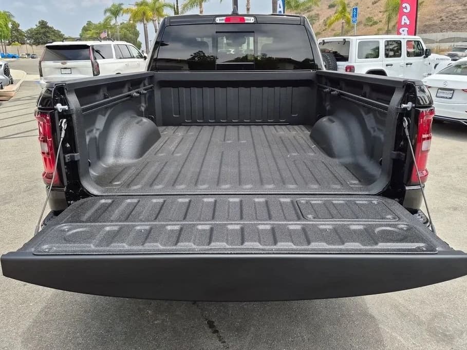 Ram 1500 Laramie 4x4 Crew Cab 6'4" Box 2026 — side view