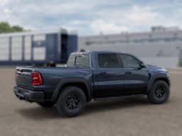 Ram 1500 RHO 4x4 Crew Cab 5'7" Box 2026 — side view