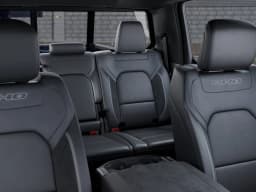 Ram 1500 RHO 4x4 Crew Cab 5'7" Box 2026 — side view