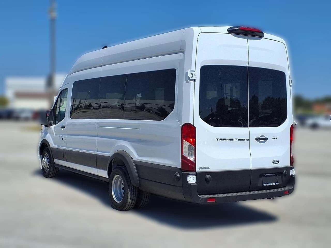 Ford Transit Passenger Wagon XLT T-350 HD 148" EL High Roof DRW RWD 2026 — side view