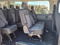 Ford Transit Passenger Wagon XLT T-350 HD 148" EL High Roof DRW RWD 2026 — side view