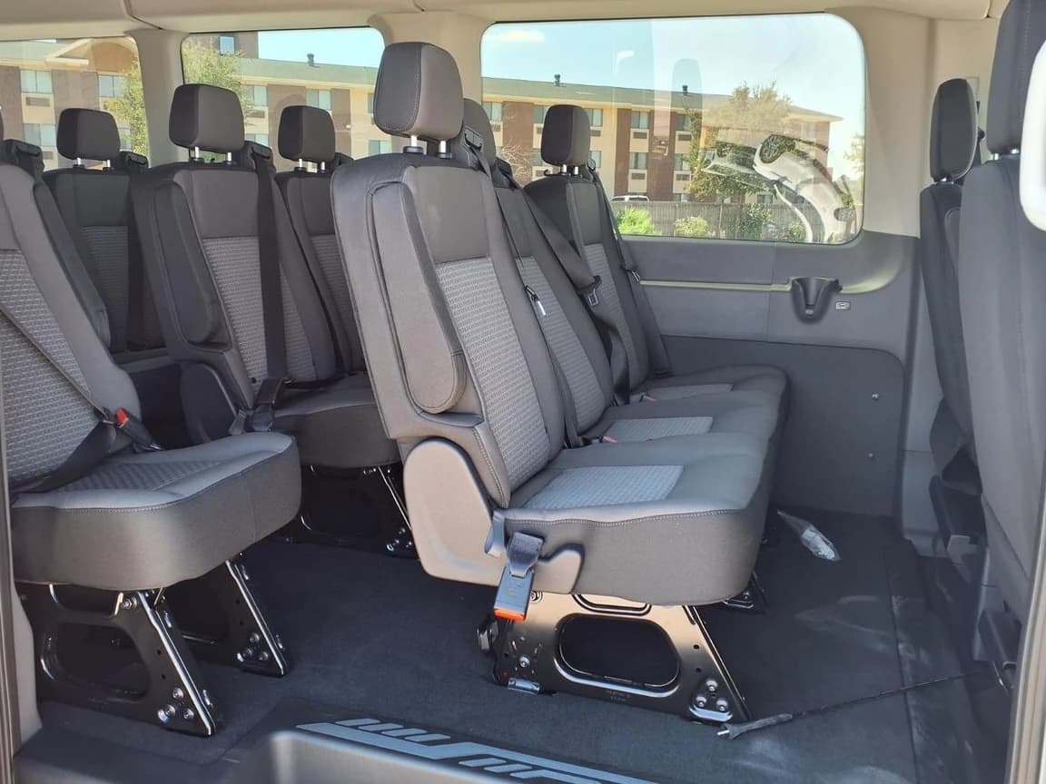 Ford Transit Passenger Wagon XLT T-350 HD 148" EL High Roof DRW RWD 2026 — side view