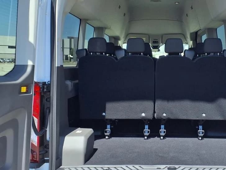 Ford Transit Passenger Wagon XLT T-350 HD 148" EL High Roof DRW RWD 2026 — side view