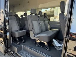 Ford Transit Passenger Wagon XLT T-350 HD 148" EL High Roof DRW AWD 2026 — side view