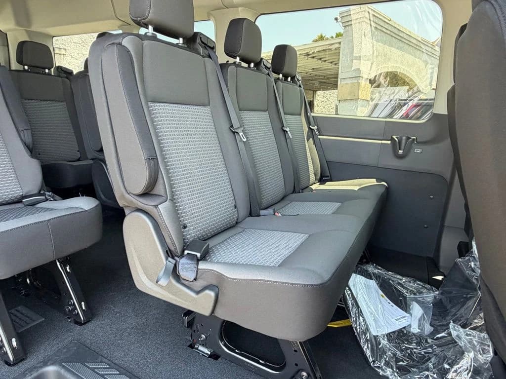 Ford Transit Passenger Wagon XLT T-350 HD 148" EL High Roof DRW AWD 2026 — side view