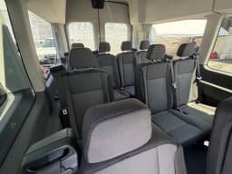 Ford Transit Passenger Wagon XLT T-350 HD 148" EL High Roof DRW AWD 2026 — side view