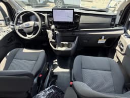 Ford Transit Passenger Wagon XLT T-350 HD 148" EL High Roof DRW AWD 2026 — side view