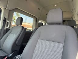 Ford Transit Passenger Wagon XLT T-350 HD 148" EL High Roof DRW AWD 2026 — side view